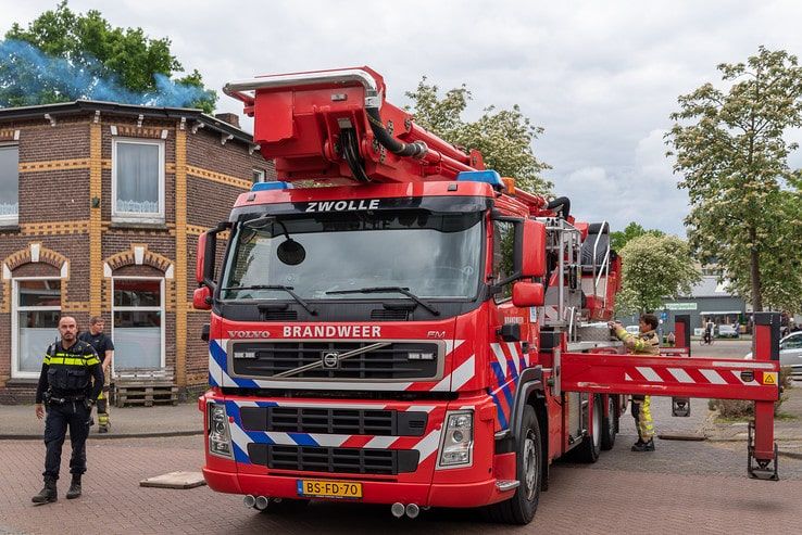 Schoorsteenbrand in woning Assendorp - Foto: Peter Denekamp