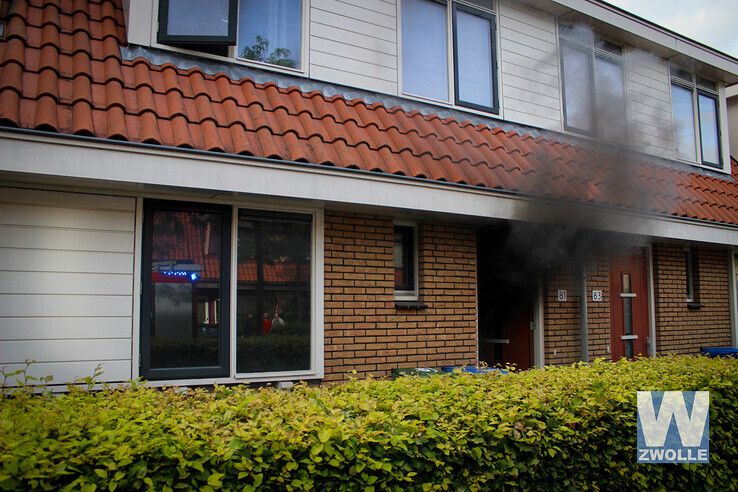 Stofzuiger vat vlam in woning Tiendschuurstraat - Foto: Ruben Meinten